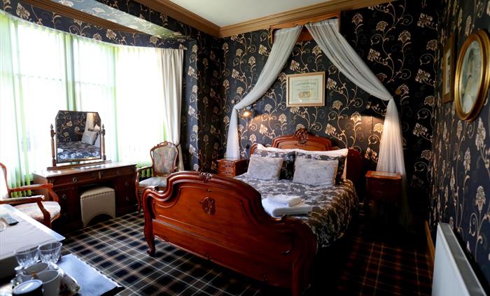 Indulge in the morning glow with a beautiful bay window in this room, offering ample light for your daily routine. 
Unwind and savor the inviting amb